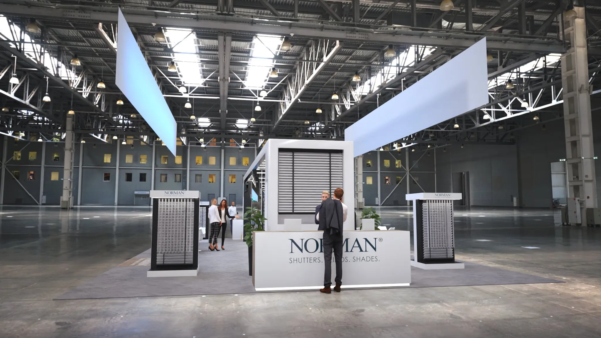 20x40 Island booth design by Reaction Space